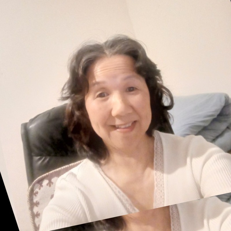 Anh Dang smiling at the camera